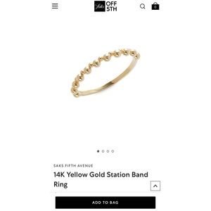 Woman’s gold ring.